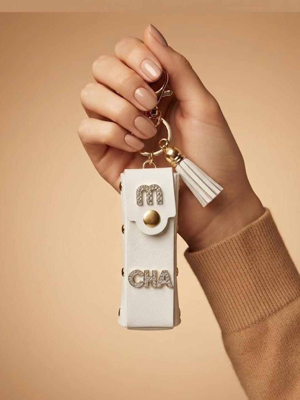 White mini wallet with gold tone studs and tassel Keychain | KCIN251