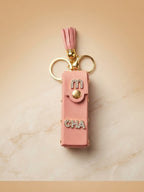 Pink mini wallet with gold tone stud accents Keychain | KCIN256