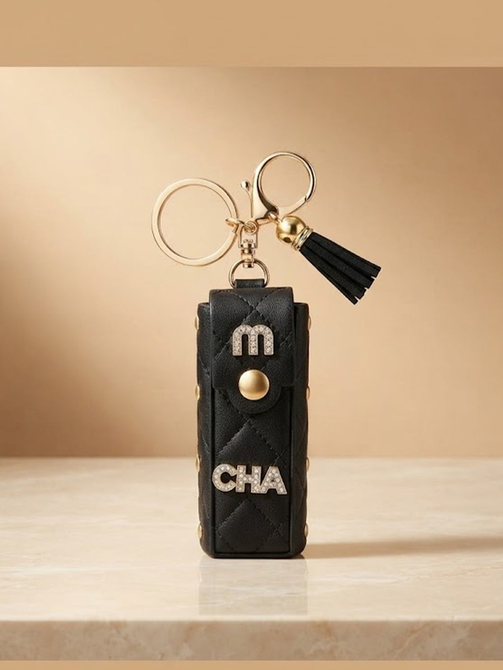 Black mini wallet with tassel and gold tone studs Keychain | KCIN257