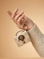 Beige patterned mini purse keychain Keychain | KCIN63