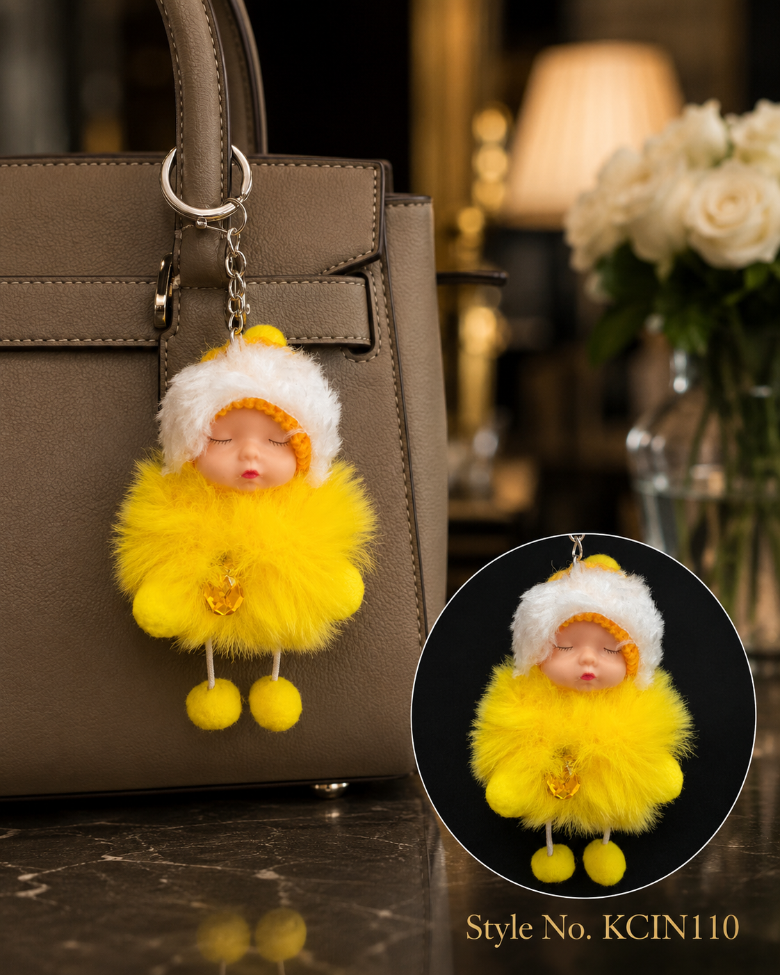 Yellow hooded plush baby doll with fluffy coat and pom details Keychain | KCIN110