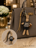 Small doll figure charm with braided cords Keychain | KCIN141