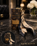 Dark brown monogram patterned cylindrical mini pouch with scarf tail Keychain | KCIN148