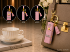 White mini wallet with tassel and gold tone accents Keychain | KCIN250