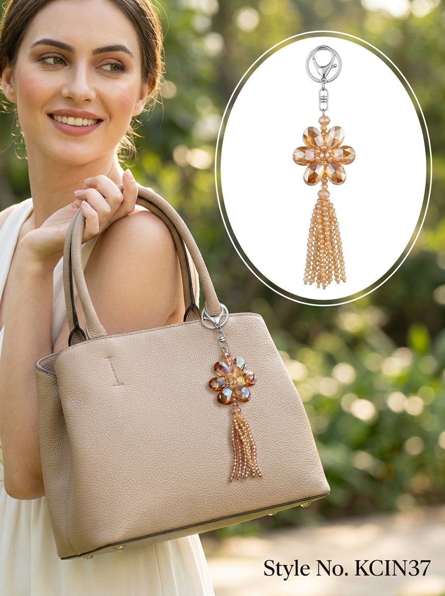 Amber flower with gold tone hanging strands Keychain | KCIN37