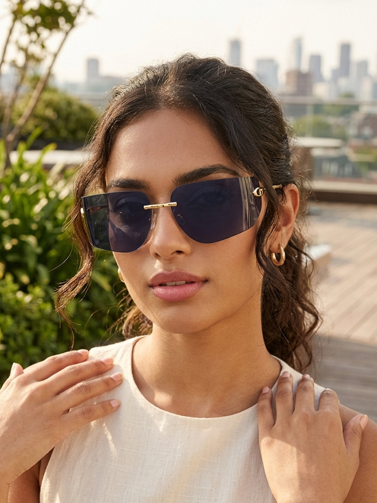 Gold and Smoke Black Rimless Y2K Wrap Shield Sunglasses