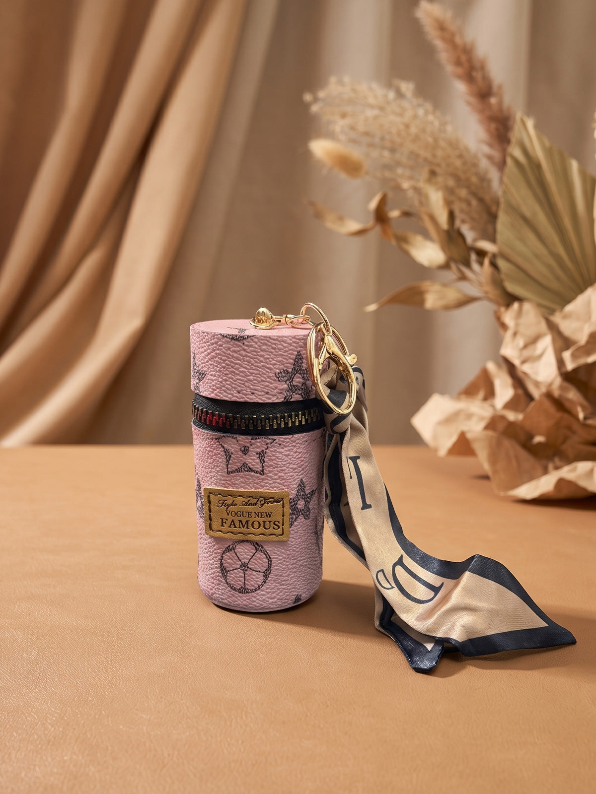 Pink cylindrical mini pouch with star pattern and scarf tail Keychain | KCIN159