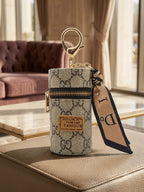 Gray patterned cylindrical mini pouch with scarf tail Keychain | KCIN153